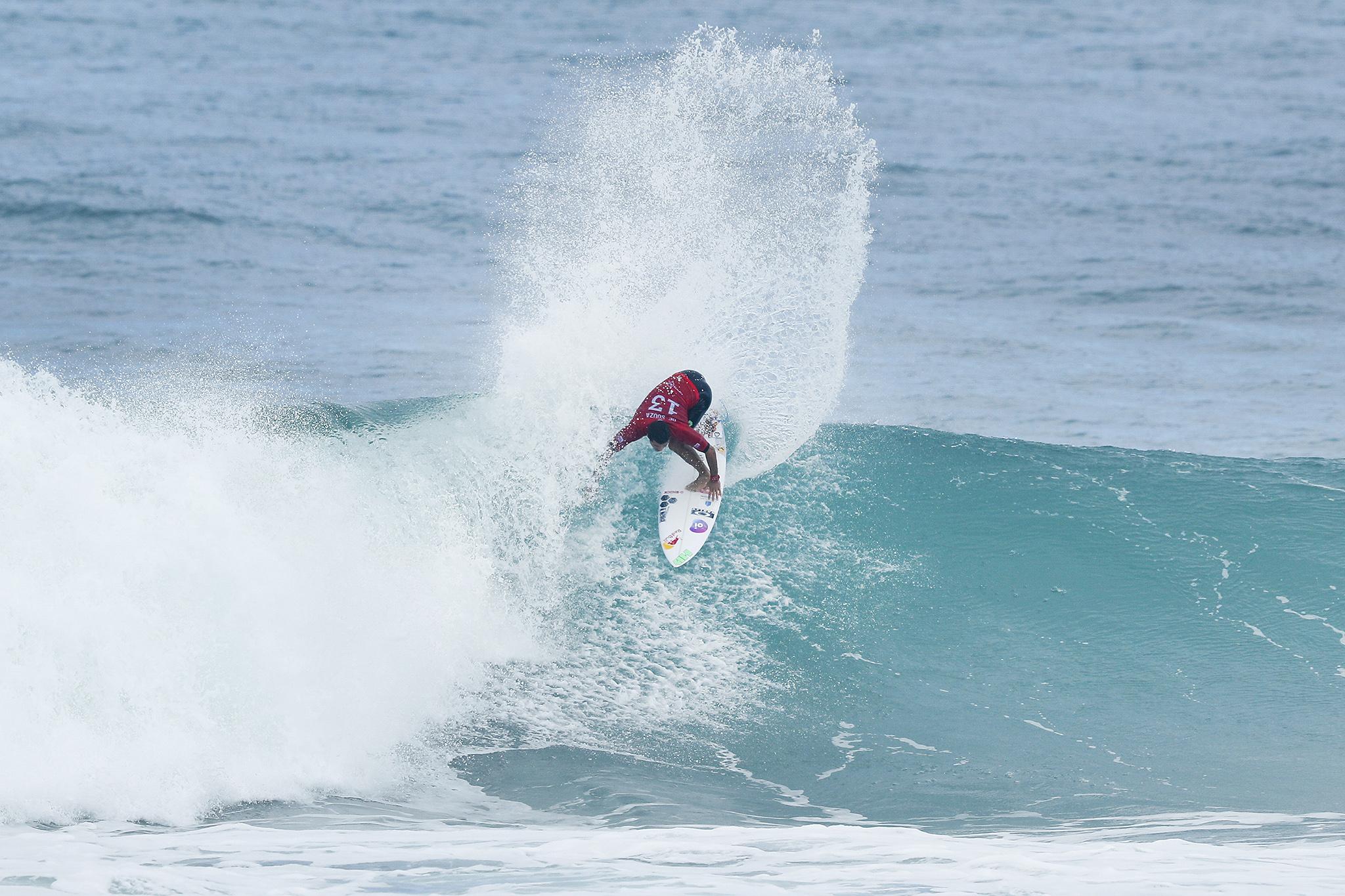 Adriano De Souza throwing up spray