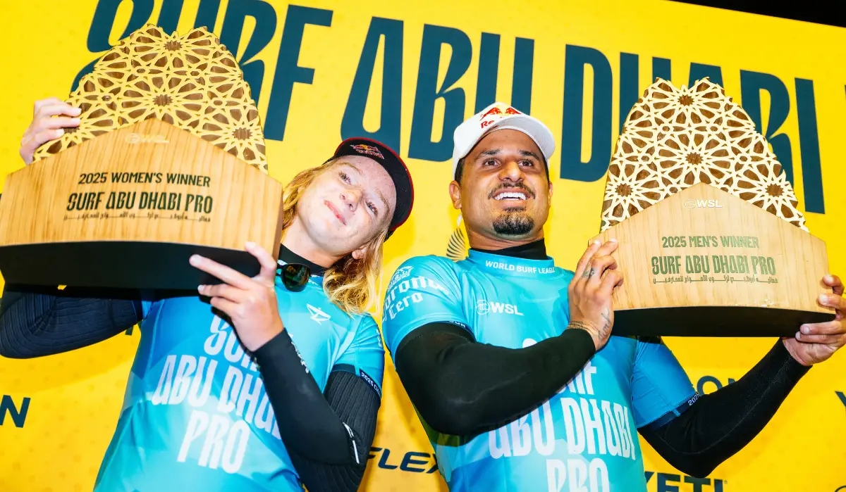 Caity Simmers and Italo Ferreira with WSL Adu Dhabi trophies
